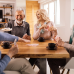 Why is Social Connection Key for People Age 60+ in 2026 Older couples playing cards. Social Connections for People Over Age 60
