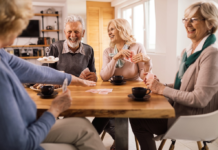 Why is Social Connection Key for People Age 60+ in 2026 Older couples playing cards. Social Connections for People Over Age 60
